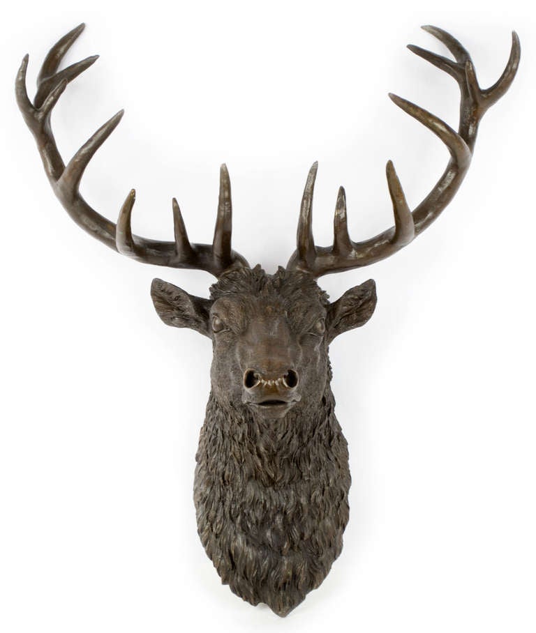 A Black-Forest-style sculpture of a Corsican red deer, stamped European bronze, with rich dark patina and detailed cold chasing.