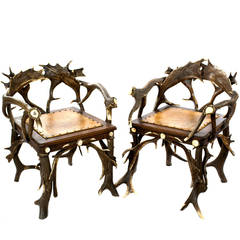 Pair of Black Forest Antler Armchairs with Leather Seats
