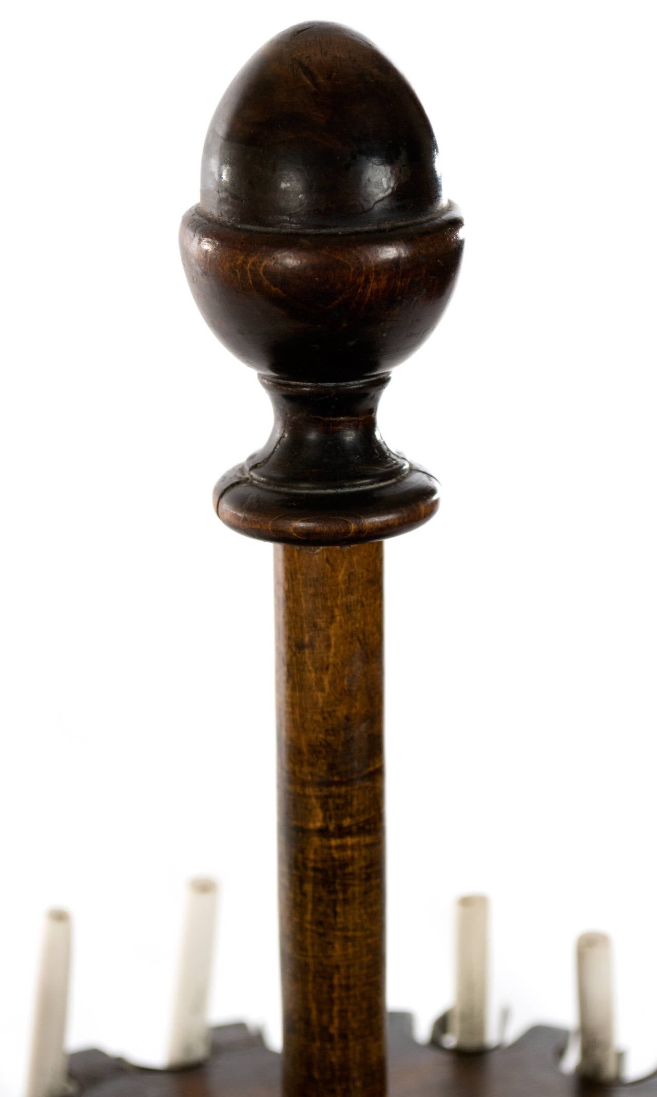 Turned in beautiful walnut, this pipe stand was made in Holland during the third quarter of the nineteenth century, and can hold several traditional clay or standard-sized pipes.