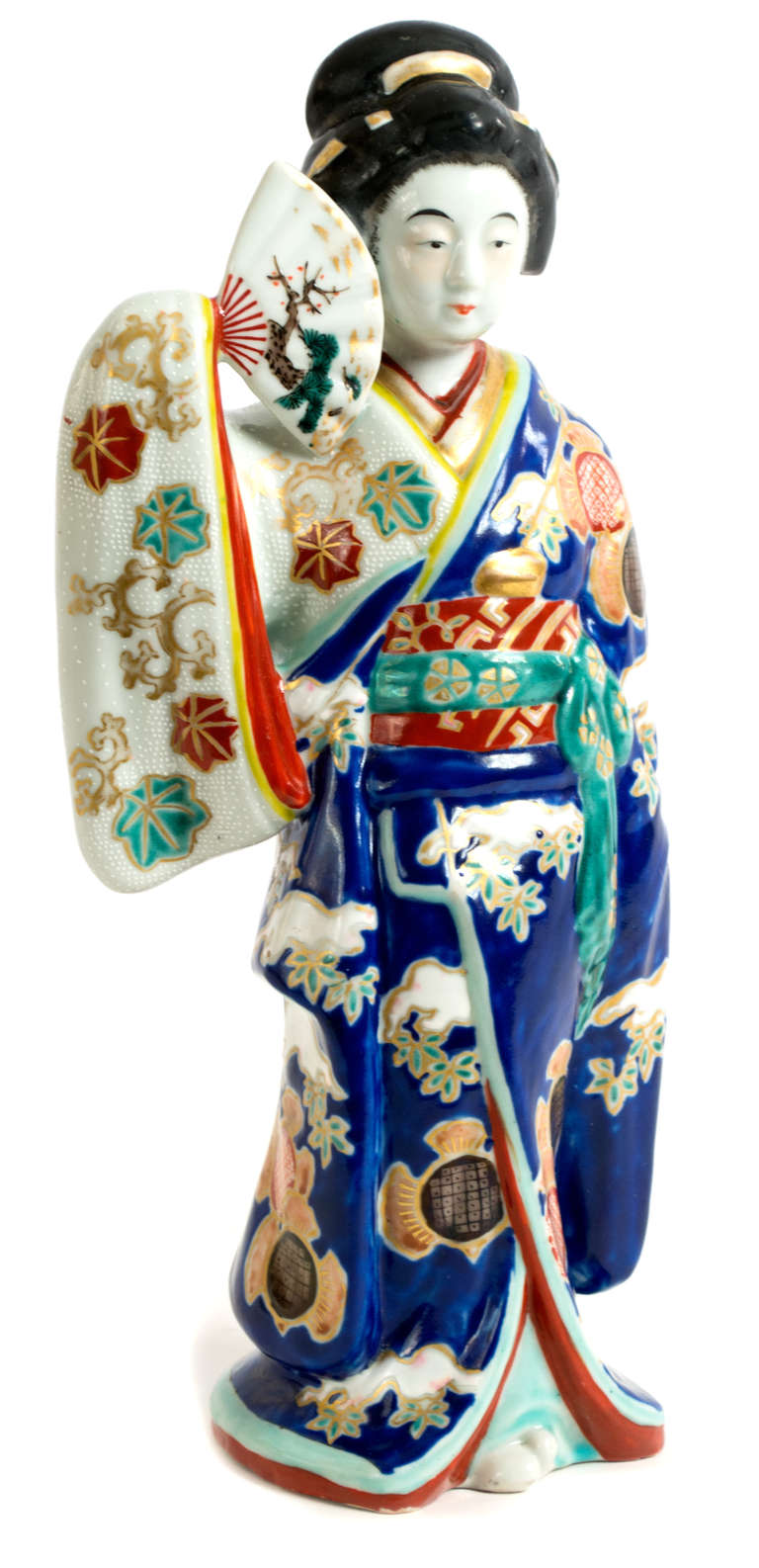 Beautifully gilt and painted with brilliant blues, reds, and greens the robes of this geisha bear the symbols of the Three Friends of Winter and references to the Sacred Gifts.