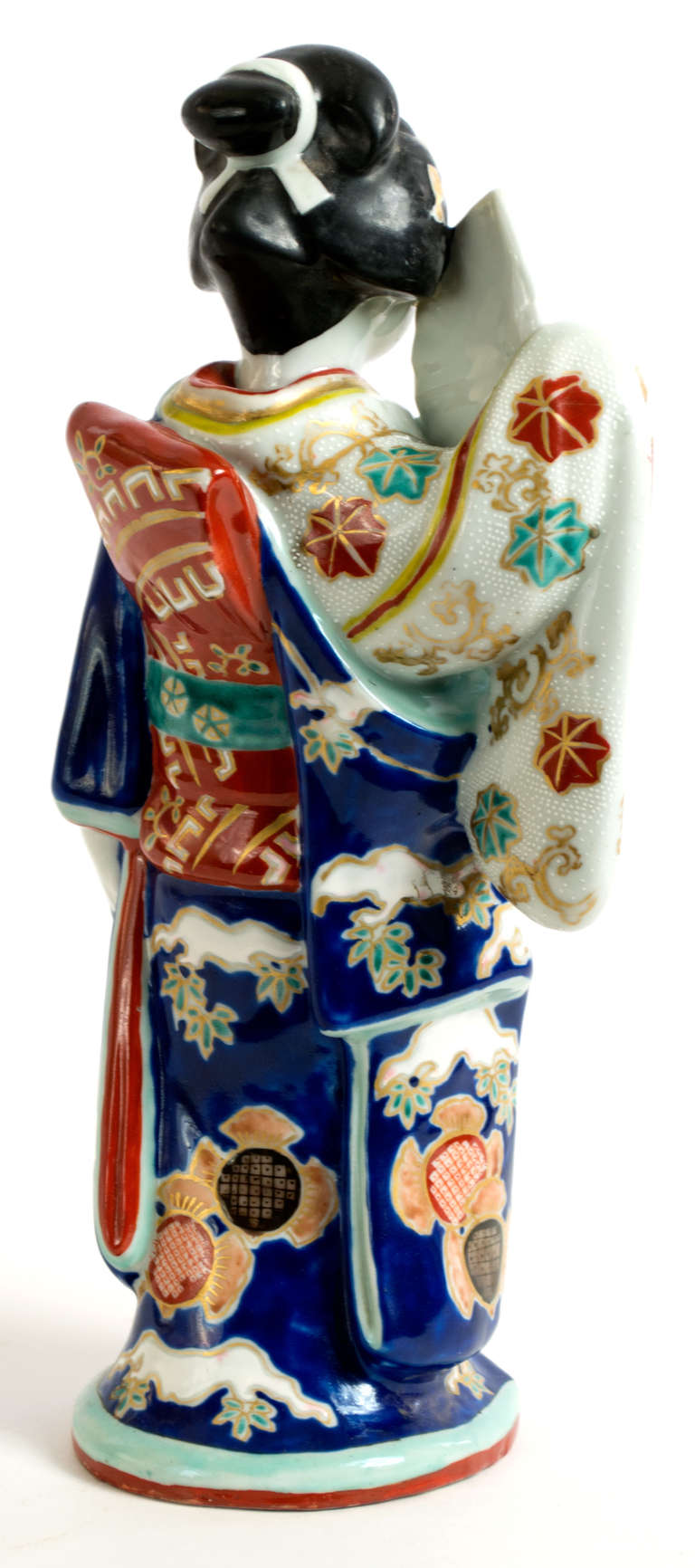 porcelain geisha statue
