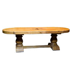 A monumental Art & Crafts French pine table with carved Maltese cross