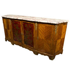A monumental French parquetry buffet with red lacquer doors