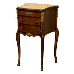 A Louis XIV Parquetry and Ormolu Nightstand