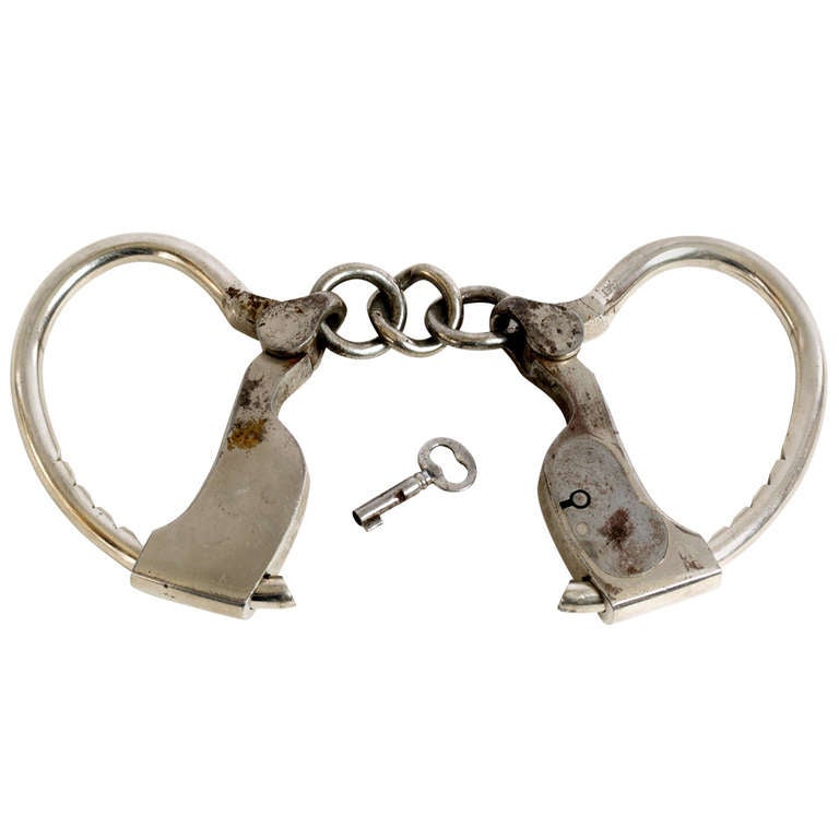 Pair of Early American Double Lock Tower Style Handcuffs at 1stdibs