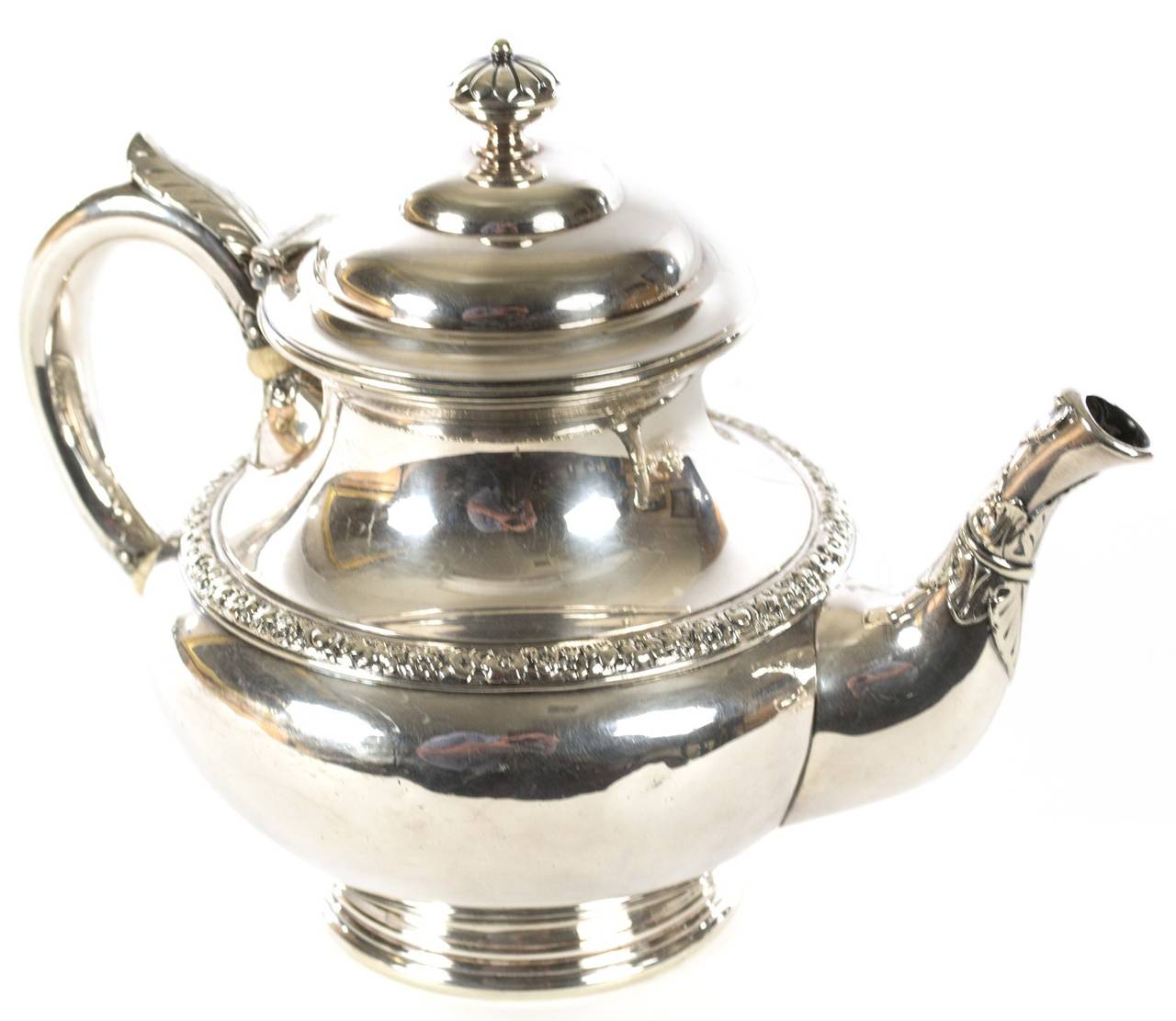 A 19th century  tea and coffee service by Tiffany & Co., featuring a teapot, coffee server, creamer, sugar bowl, and bowl with cover on a tray.