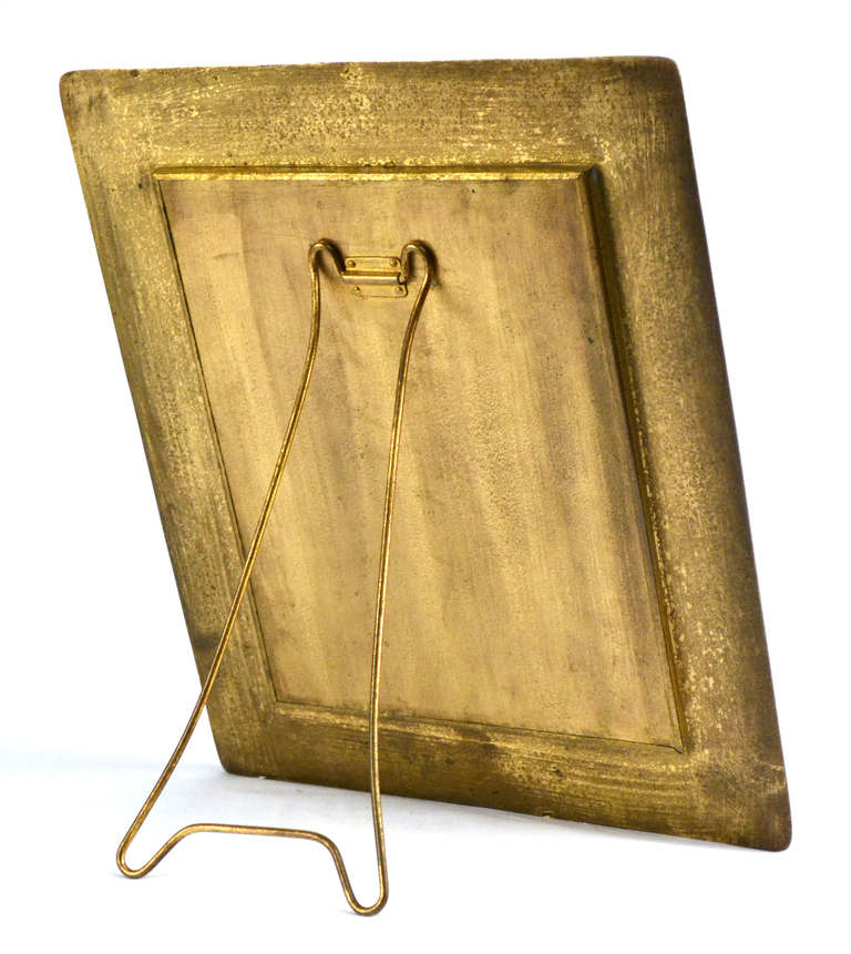 A large standing picture frame in gilt bronze with the 12 signs of the zodiac, stamped and numbered 