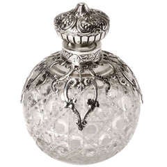 Circular Silver and Glass Perfume Bottle