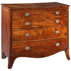 An Antique Georgian Mahogany Bowfront Chest.