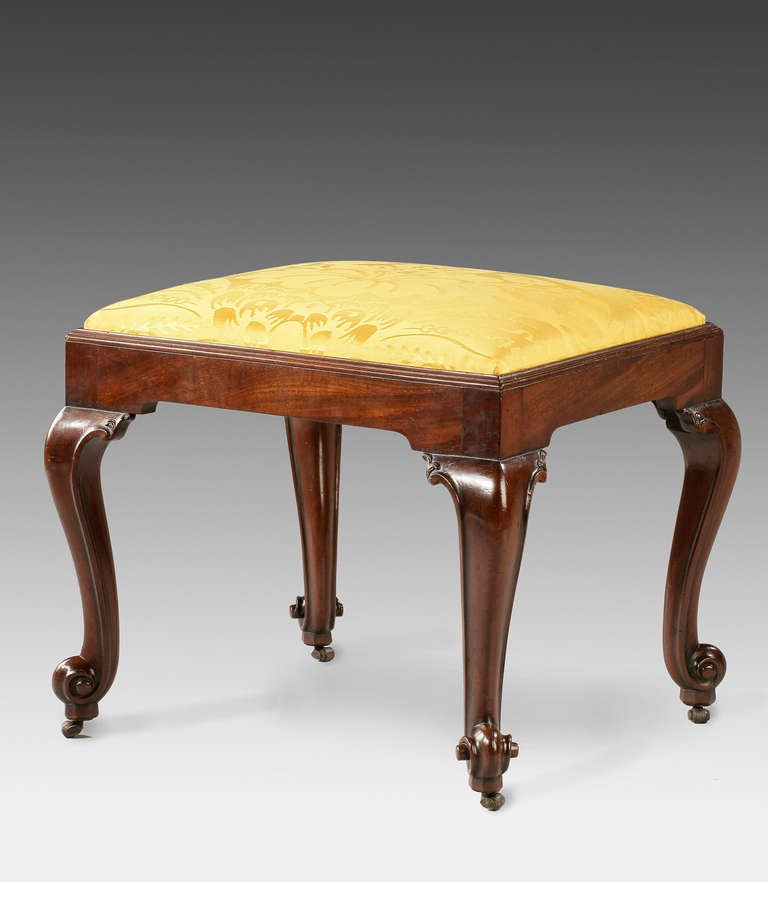 A fine George III Chippendale period mahogany cabriole leg stool. The drop-in seat above well drawn cabriole legs which terminate in French scroll toes. Having a good color and patination.