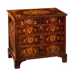 An Antique William And Mary Oyster Veneered Chest.