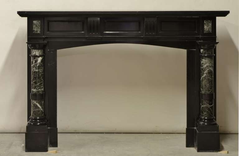 Late 19th Century, Dutch Black Marble Fireplace with Green Marble Pillars

Opening measurements: 33.3 x 40.4 inch (height x width).