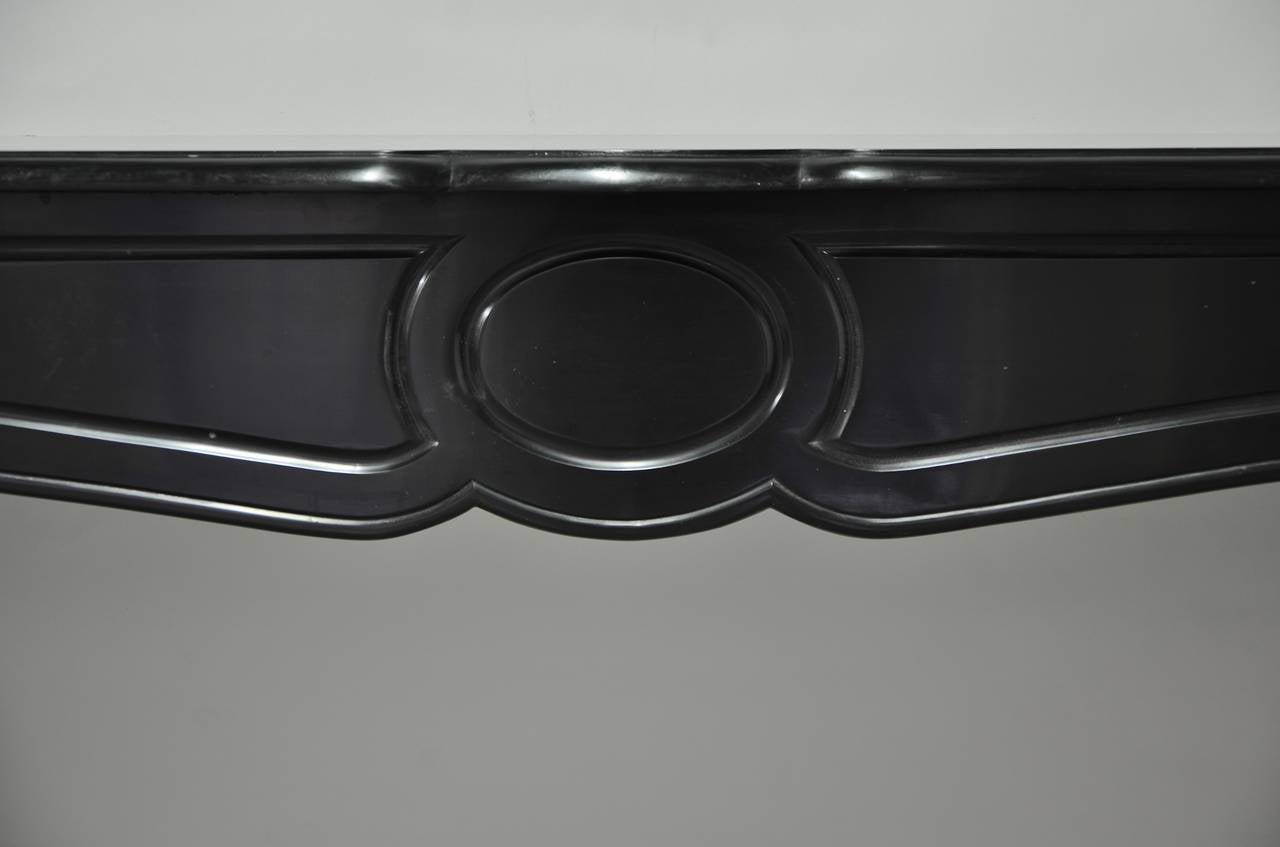 French pompadour in black marble.

Opening measurements : 34.1 x 35.8 inch (height x width).

Restored
