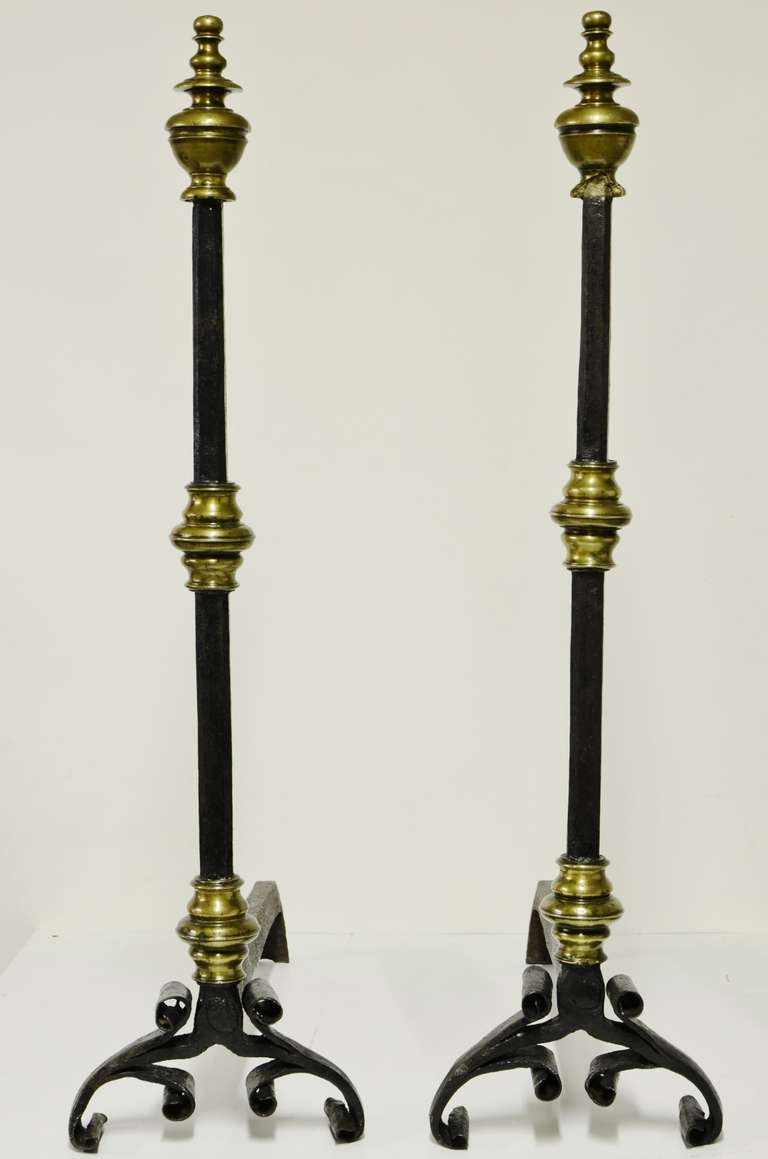 A tall and elegant pair of Dutch andirons, early 17th century.