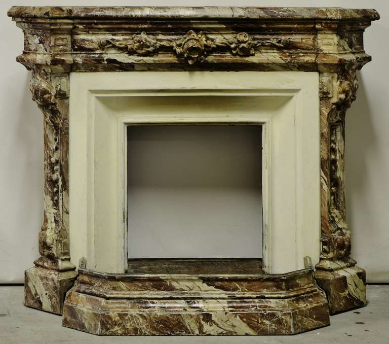 Very lovely decorated, small cast iron fireplace from the 19th century.

The firebox opening is:
Height: 15,55 inch (39.5 cm)
Width: 17.71 inch (45 cm)