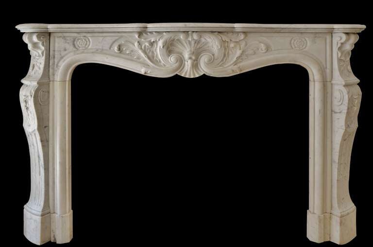 This very fine carved Louis XV mantelpiece from Paris has original deep paneled returns.

Opening measurements: 34.6 x 42.1 inch.
Sold by Willem Schermerhorn Antique Fireplaces