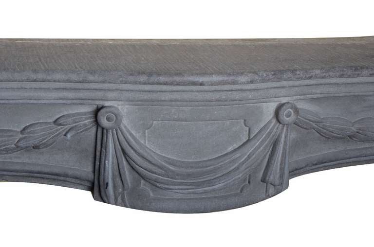 Rare and beautiful 18th century Italian Louis XIV fireplace made from grey white sandstone. Very fine carvings, excellent condition.

Opening measurements : 43.3 x 51.2 inch. (110 x 130 height x width in cm.)

Ready to be shipped and installed