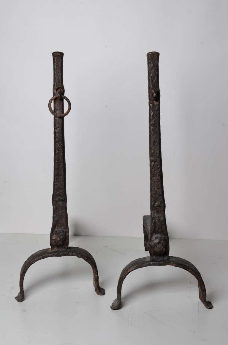A tall pair wrought iron andirons from the 17-18 th century.
Gothic period.

One front ring is missing.