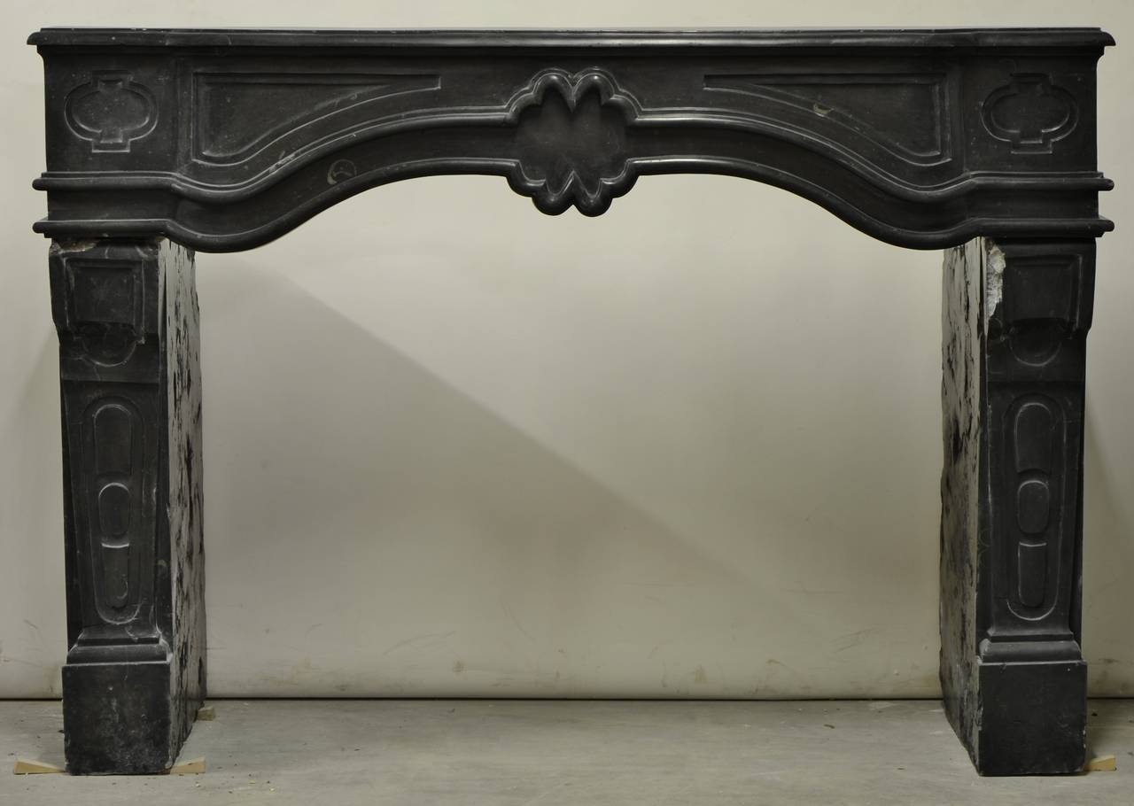 Antique French Black Limestone Louis XIV Fireplace Mantel at 1stdibs View this item and discover similar fireplaces and mantels for sale at 1stdibs - Deep black