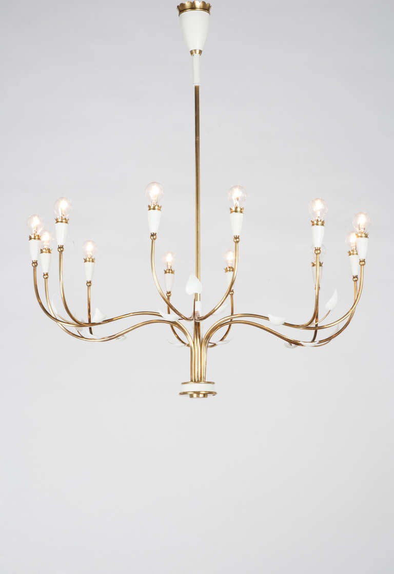 Pair of 1950s chandeliers in polished and painted brass with six arms and 12 lights. The chandeliers differ slightly in minor details, sold also separately.