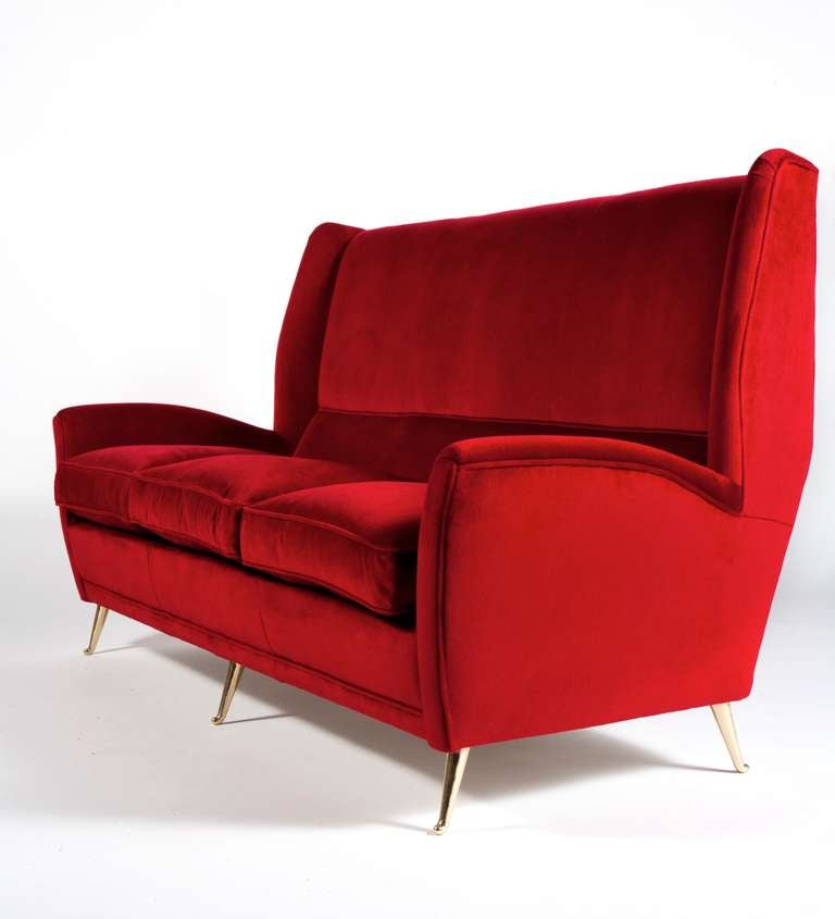 High back 3 seater sofa with armrests upholstered in red cotton velvet | Solid cast brass feet