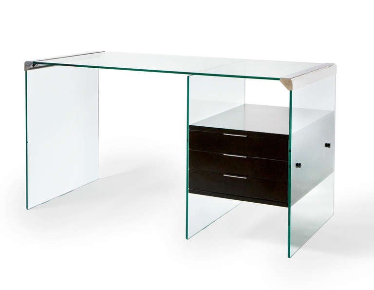 Small desk in clear glass and polished steel |  Three side drawers  in ebonised wood with polished steel handles