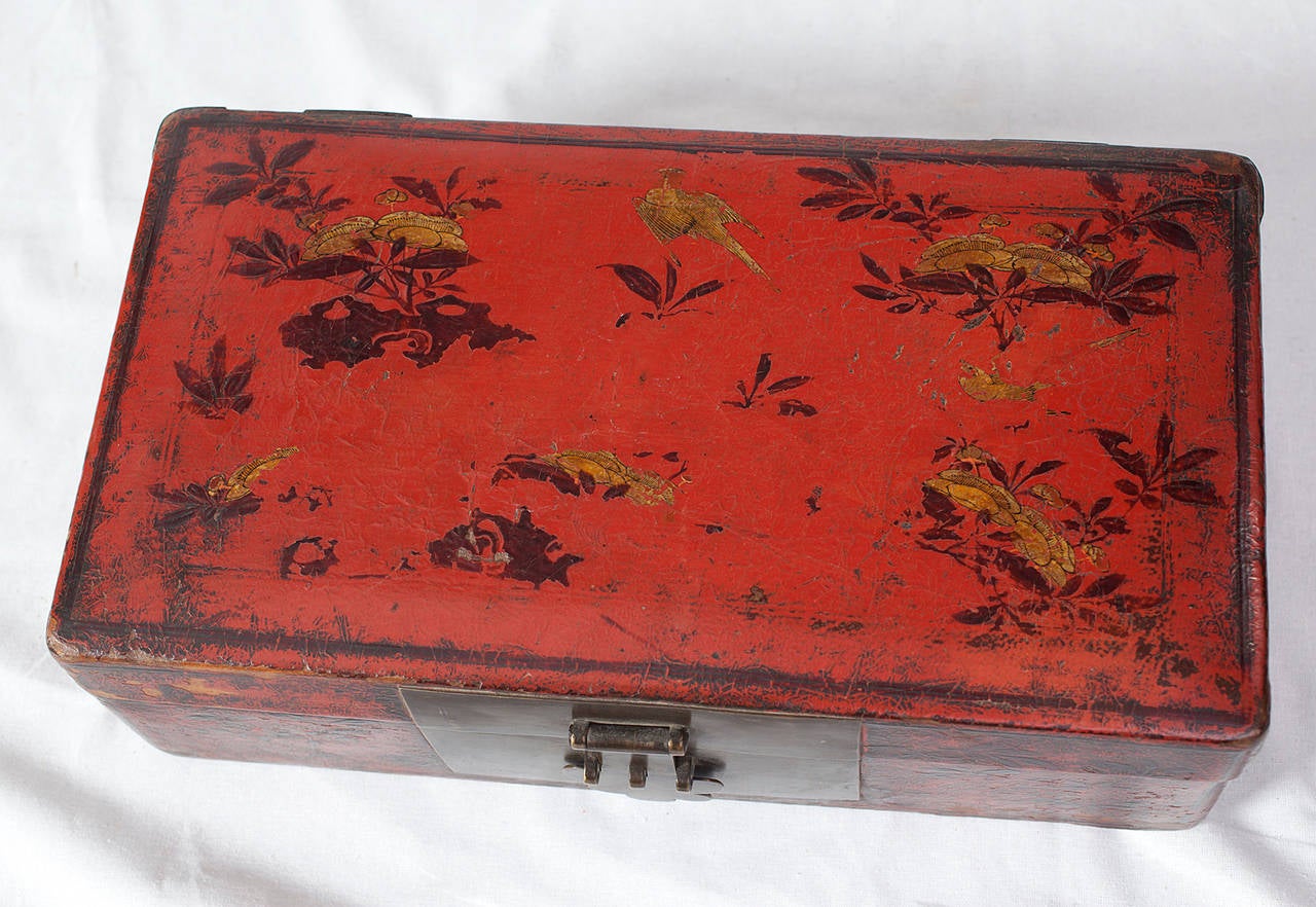 ***SUMMER SALE***
This Ming dynasty scholar’s document box was skillfully crafted from wood, leather, lacquer and brass, all materials that have developed a rich patina over time. 

The wooden corpus of this box was first covered with a layer of