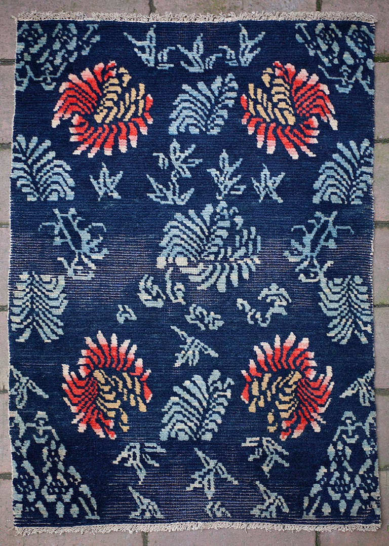 Antique Tibetan Rug with Unusual Flower Design