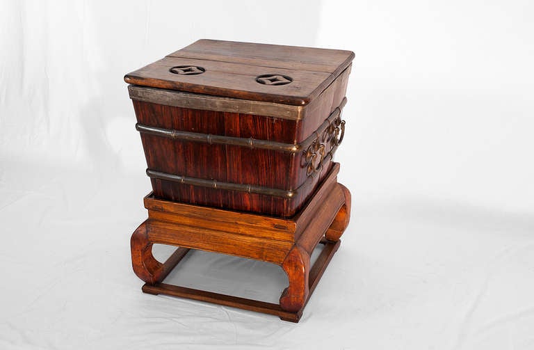 ******End of summer sale******
This transitional period ice box, made from blackwood (chin: hongmu) and walnut wood, served a dual purpose: it kept food cold and released fresh air through the openings in the lid, much like an early air conditioner.