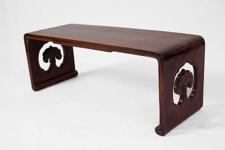 
This 18th century kang table made from walnut wood is characteristic of Shanxi furniture yet a rare find. 

The kang is typically the centre of the house in the colder parts of Northern China. It is a brick platform, which connects to the stove and