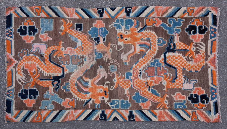 Chinese Pair of Charming Antique Tibetan Double Dragon Khaden Rugs For Sale