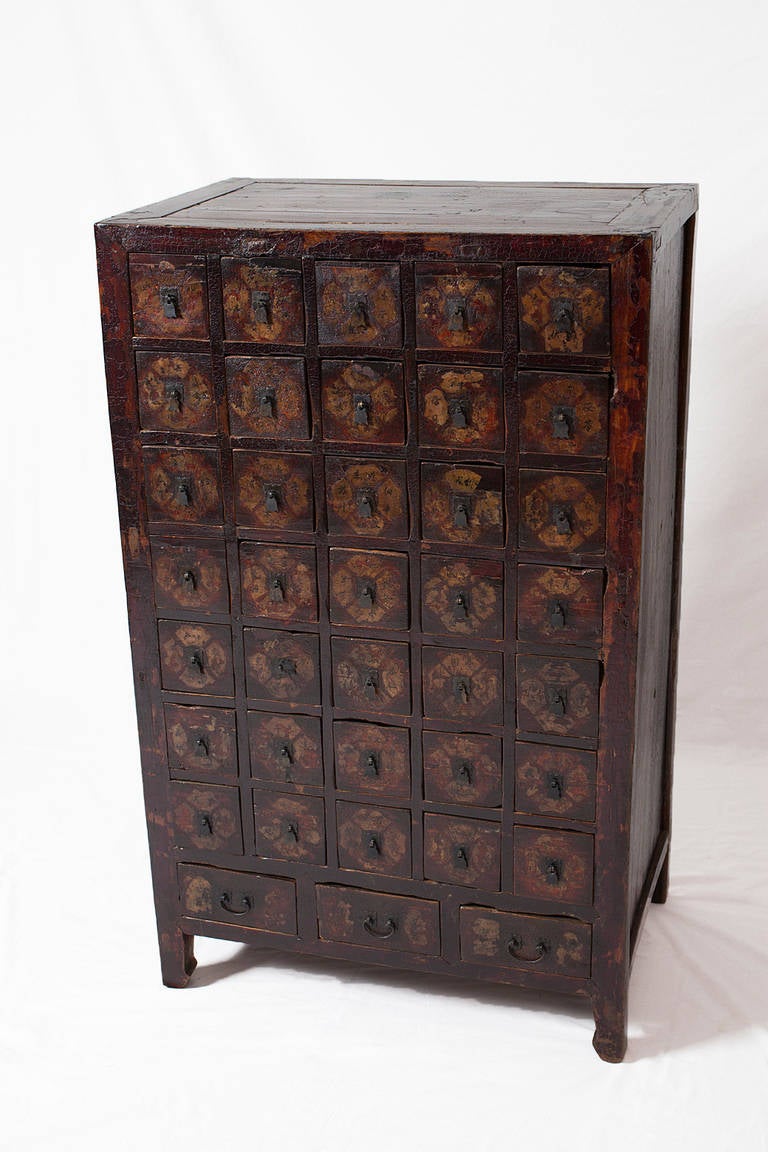 ***SUMMER SALE***
A Chinese doctor used this traditional medicine cabinet from Shanxi province to store ingredients for his remedies.

This cabinet houses 38 drawers, 35 smaller ones with four compartments each and three bigger ones at the bottom.