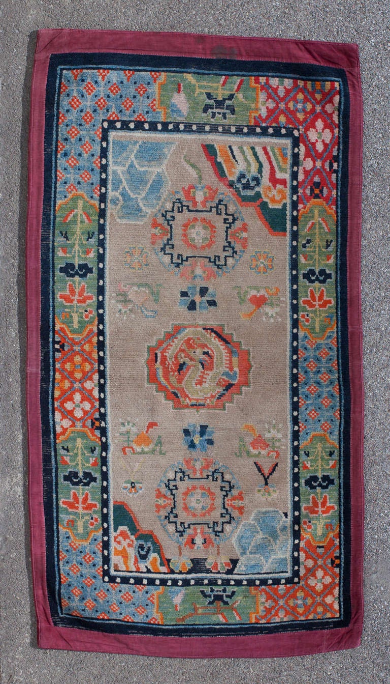 This lovely Tibetan Khaden brings the summer into your tent (or house). For Tibetan nomads, the winters on the plateau are long, cold and gray. One way to bring color into their lives is the Khaden (sleeping rugs) they sit and sleep on.

For this