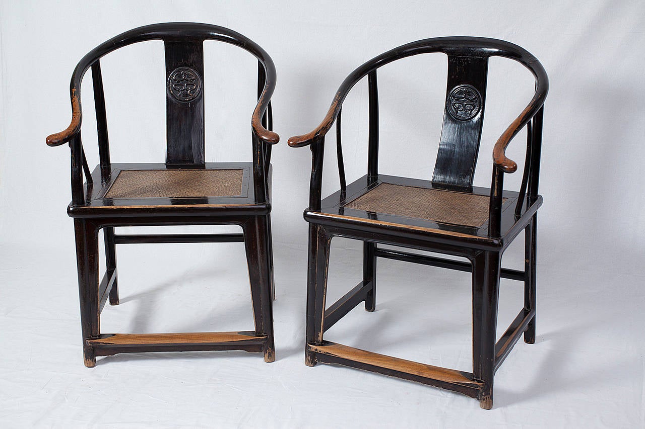  ***Autumn SALE***
This impressive pair of Shanxi province black lacquer round back or horseshoe chairs dates to the transitorial period between the late Ming and early Qing dynasties. 

These iconic chairs were the inspiration for the famous Danish