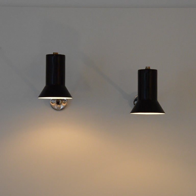 pair of wall sconces by Tito Agnoli Mod. 1127 for O-LUCE

shades meassure : height 13 cm , diameter 10cm