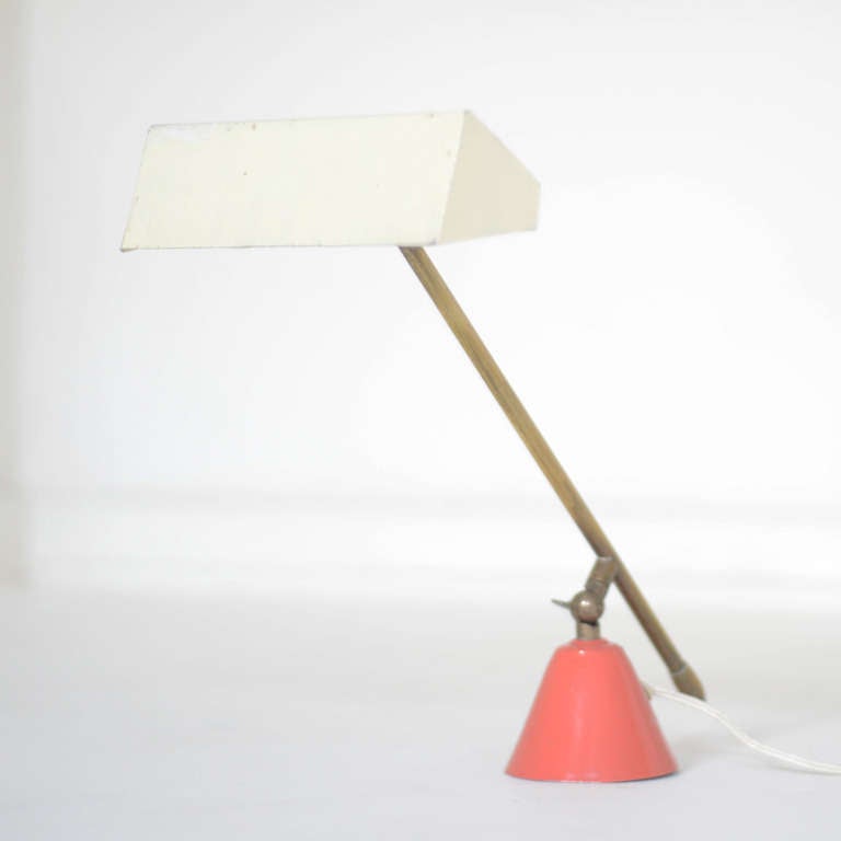 Adjustable Italian table lamp.