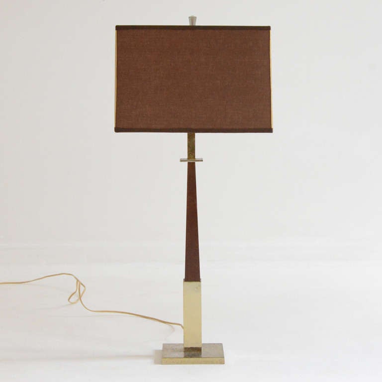 very stylish obelisk Table Lamp , shade made of Huan Silk 
and gold plated Base