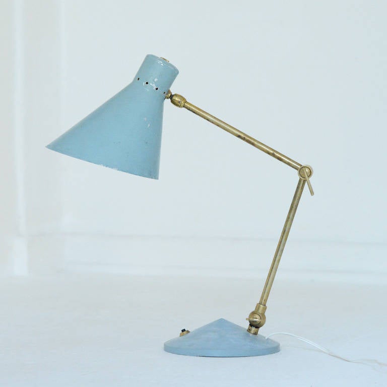 cute table lamp edited by Stilux , Milano 
shade rotates in all directions , adjustable in height and angle
maximum height 46 cm
shade diameter 16 cm , height 18 cm

paint on shade in original condition with some wear