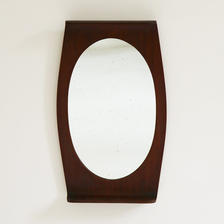 Very beautiful rosewood home trino mirror by Franco Campo and Carlo Graffi.