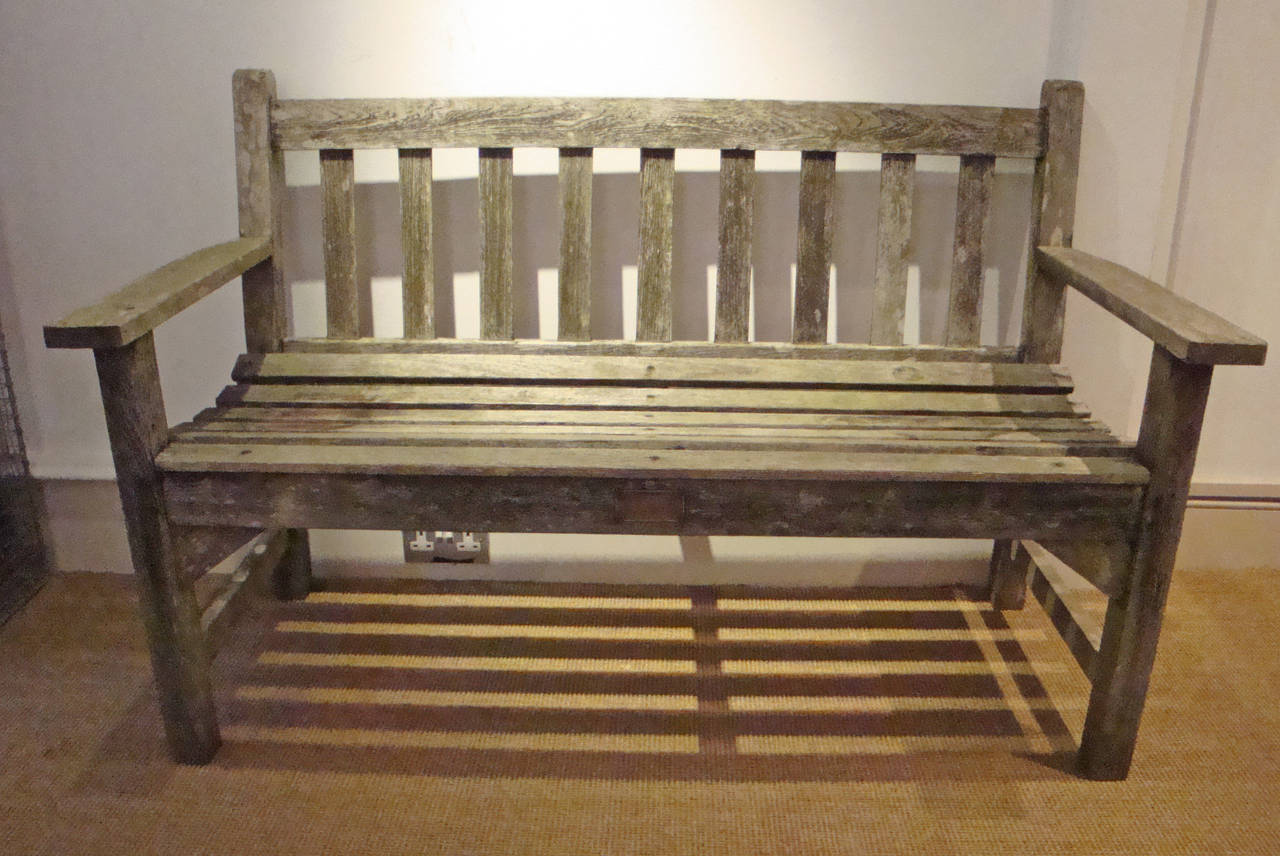English teak park bench with curved seat circa 1940