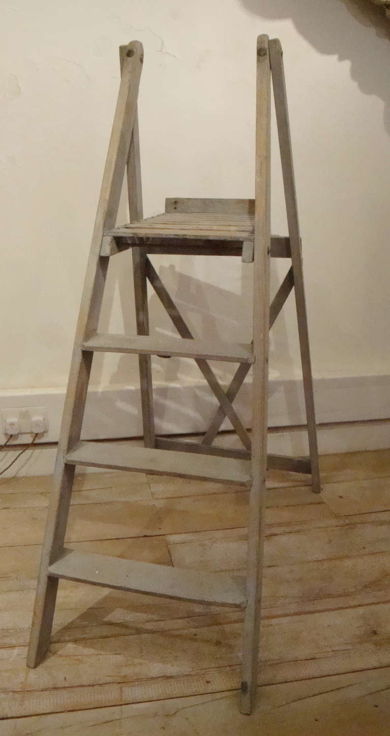 Charming French step ladder circa 1920 with remains of old blue paint.