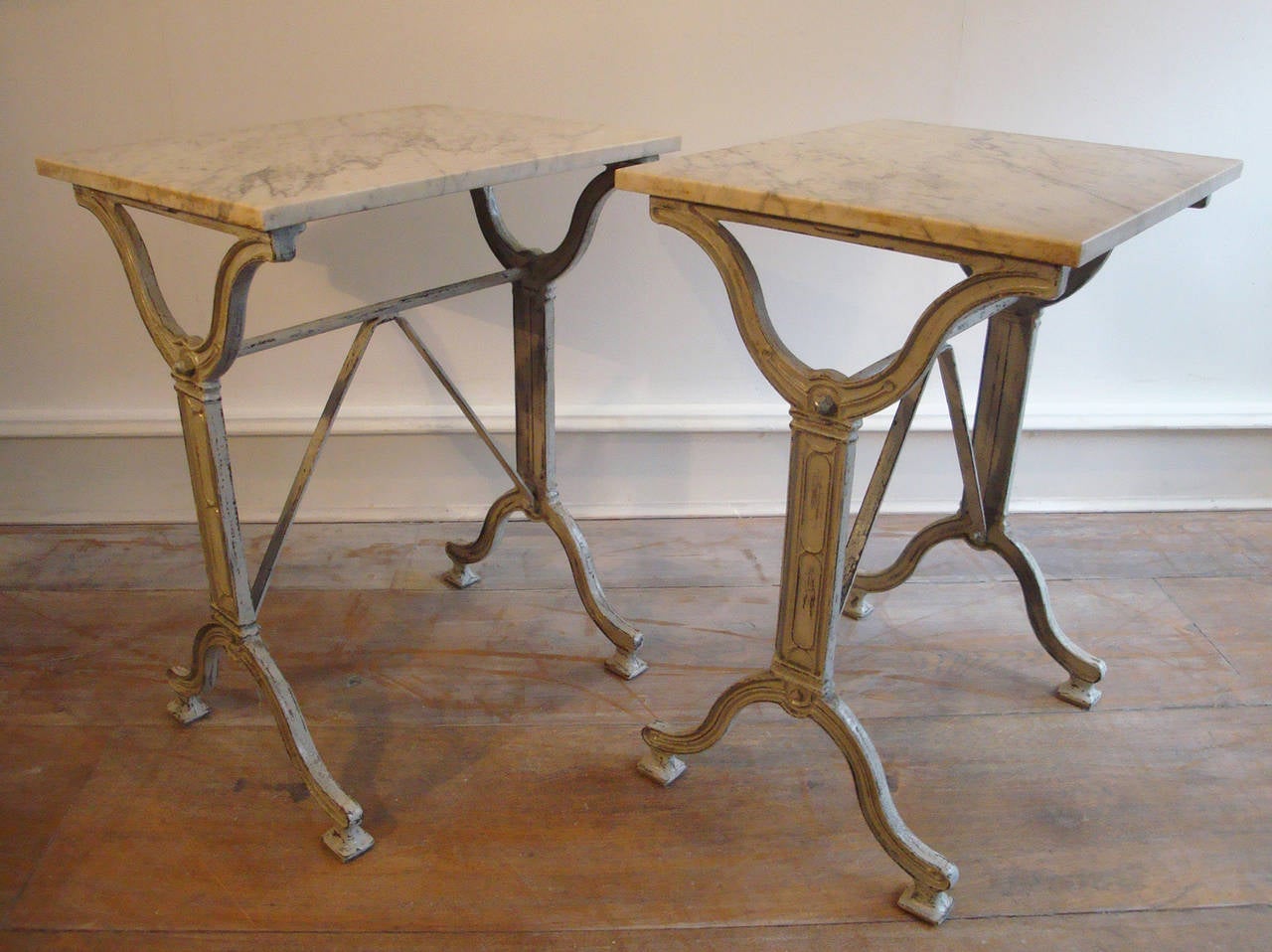 A nice little pair of French cast iron tables with marble tops that could be pretty bedside tables or sofa tables. They would also be perfect in the garden,
circa 1920.