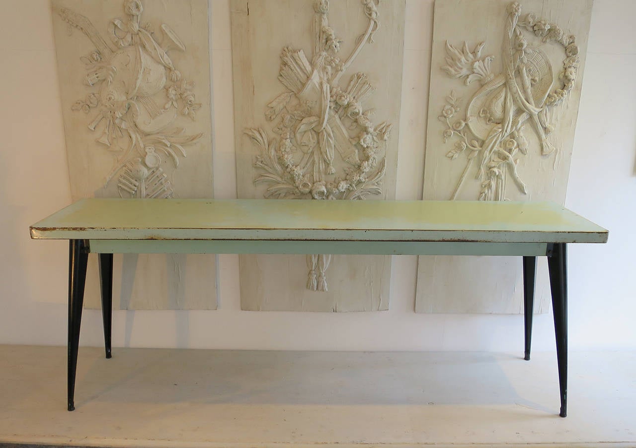 1930s French Tolix pressed iron console tables from the famous Tolix company with original eau de nil tops.
Two available.