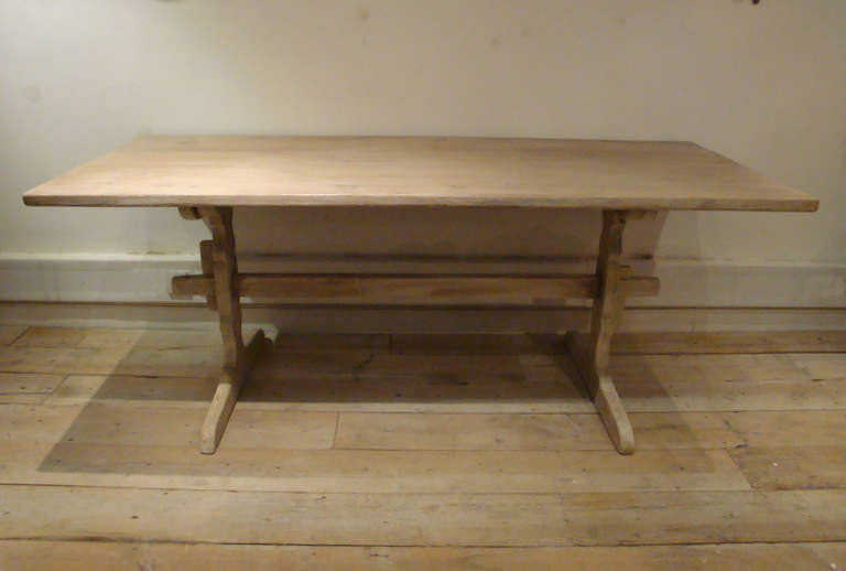 19th century Swedish streather base pine table. Nice wear to the base and exceptionally clean top