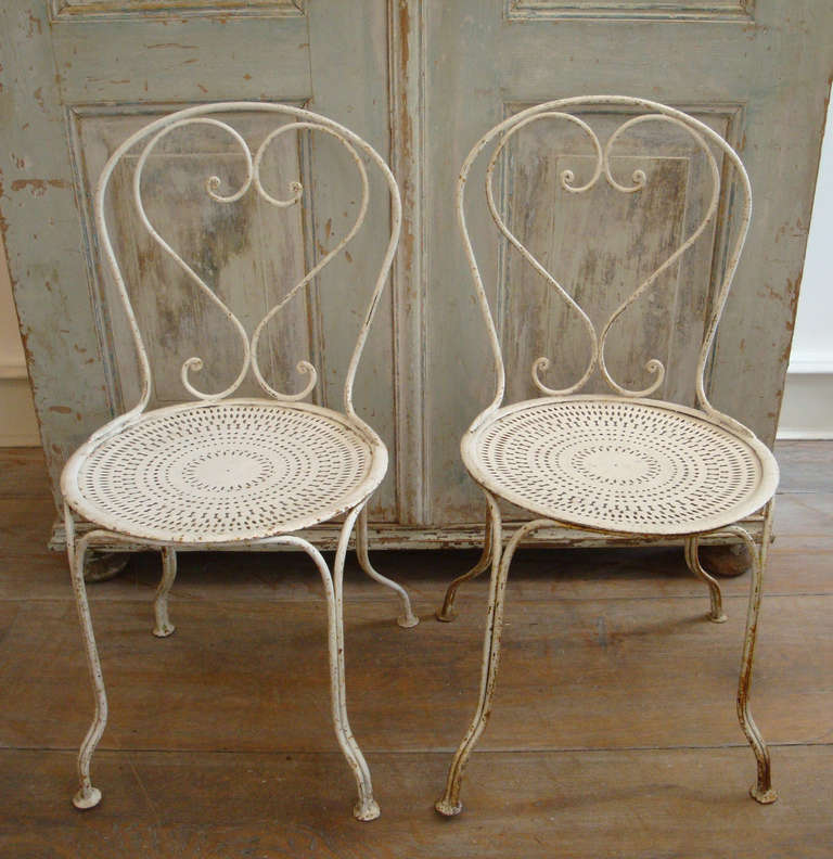 Set of Four French Iron Chairs 1