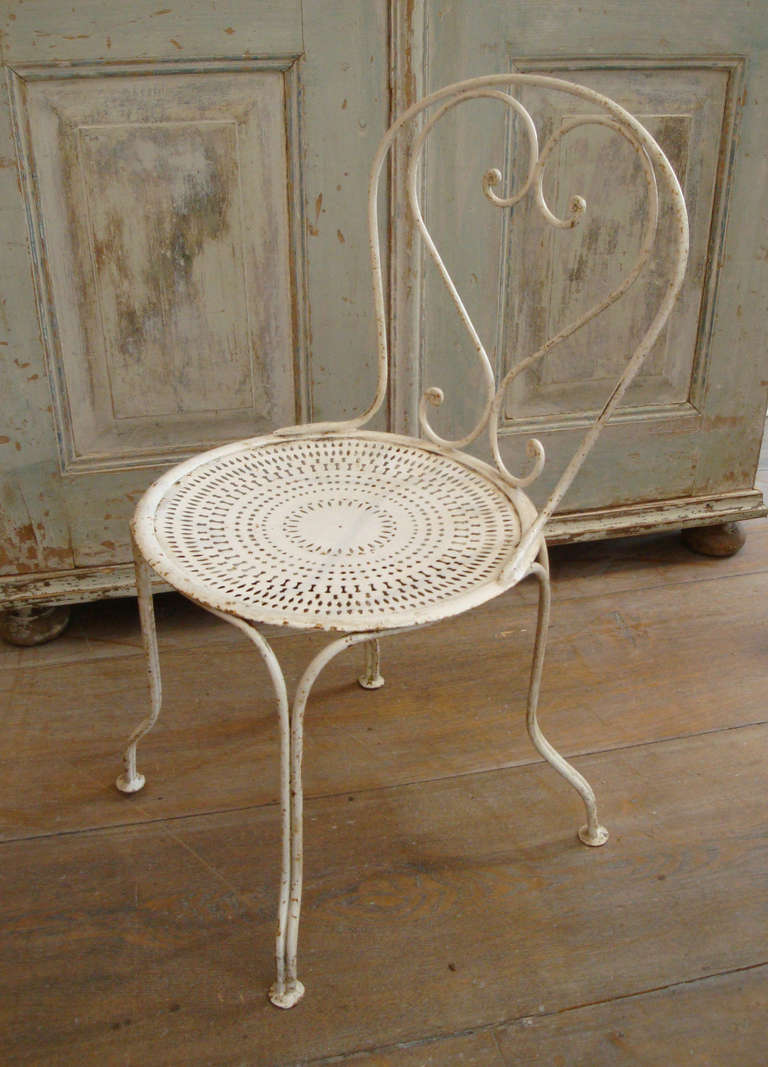 Set of Four French Iron Chairs 2