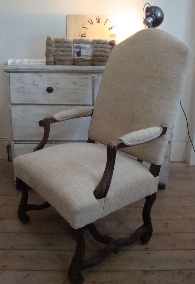 A very handsome large and comfy French armchair. 18th century from `Louis X1V` period. All re-upholstered with heavy antique linen.