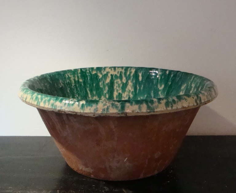 19th century Italian terracotta bowls with `splatter` glaze. Used  for mixing and proving dough in the bread making process and for marinating olives