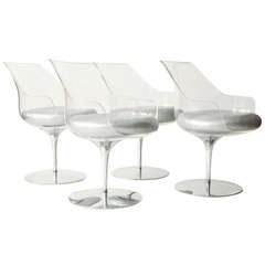 Set of four Erwin and Estelle Laverne Champagne Swivel Chairs