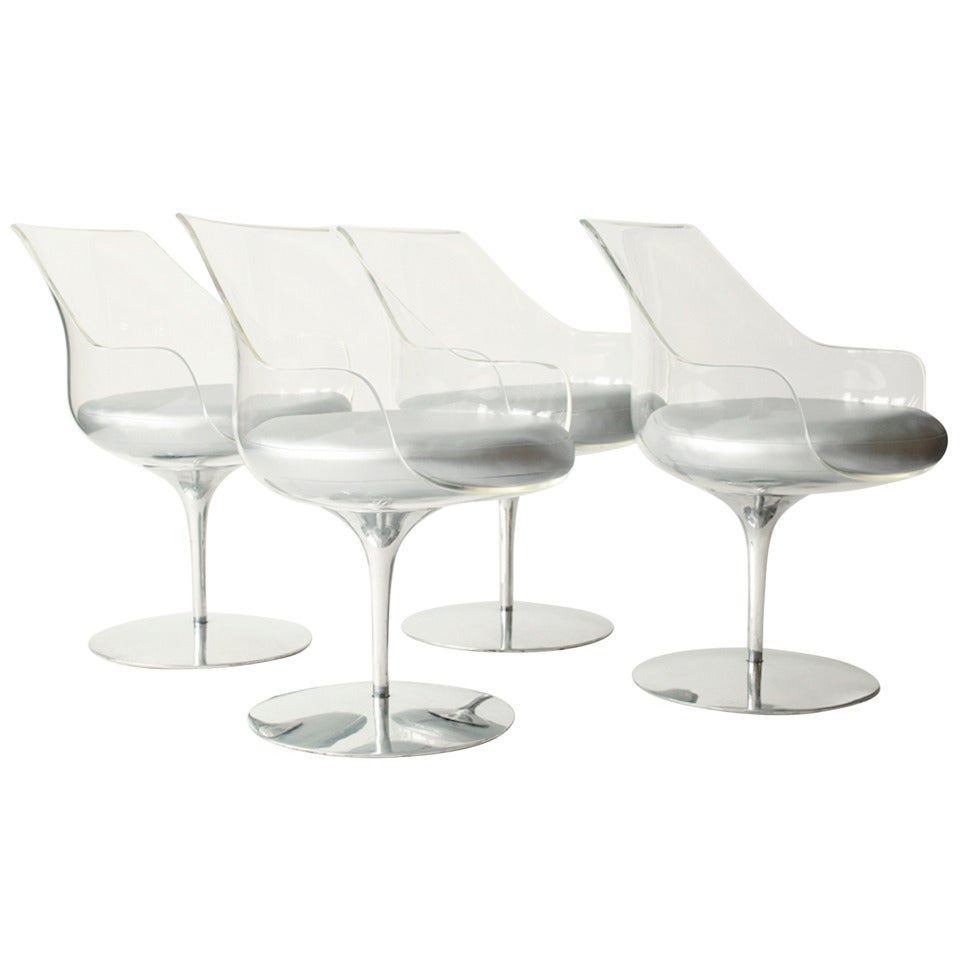 Set of four Erwin and Estelle Laverne Champagne Swivel Chairs